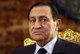 Foto : Husn Mubarak Prezident Egypta.  Foto : Reuters
Narodil sa 4. mja 1928. Bval vojensk pilot, v aprli 1975 vymenovan za viceprezidenta Egypta. Po atentte na prezidenta Sadata sa stal hlavou ttu (1981). Egypt bol za jeho vldy lenom spojeneckej koalcie v Perzskom zlive (1991). Ich pechota bola jednou z prvch, ktor vstpila do Saudskej Arbie, aby z Kuvajtu vyhnala vojsk Iraku. Egypt dostal za kadho svojho zabitho vojaka odkodn 500-tisc dolrov. Tieto peniaze + odmena za as vo vojne znamenali, e Egyptu odpotali 20 milird dolrov dlhu. V druhej vojne proti Iraku (2003) sa u Egypt nezastnil. Mubarak tvrdil, ... zobrazi viac e najprv by sa mal vyriei konflikt Palestna-Izrael.Poda niektorch informci preil Mubarak es pokusov o atentt. Informovala o tom BBC. V ostatnch rokoch sa hovorilo o vekej korupcii v jeho aparte, aj vo vlde. Okrem toho odolva kritike, e vzn svojich politickch odporcov. asopis Parade Magazine ho zaradil medzi 20 najvch dikttorov roku 2009.